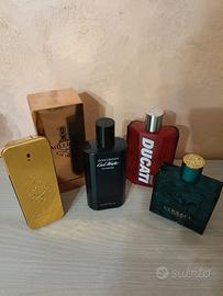 Set 4 bottiglie di profumo vuote firmate