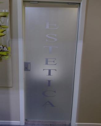 Porta in vetro scorrevole interno muro