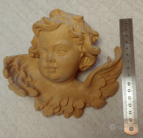 Angioletti scolpiti in legno