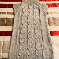 Maglione smanicato con collo dolcevita