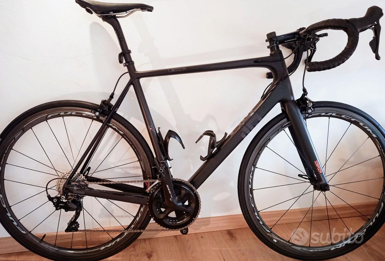 Vélo De Course Carbone Amorti - Taille 57cm - Poids 8.8kg - Couleur Fuchsia Fluо