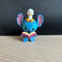 Stitch con paperella e libro Lilo e stitch