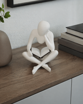 Statuetta lettore con libro – decorazione moderna