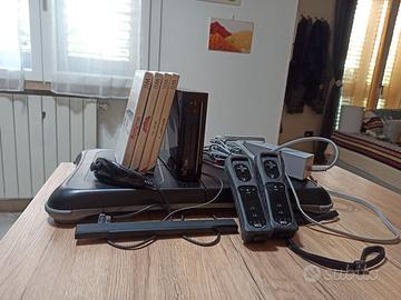 Console Nintendo Wii + pedana + 4 giochi