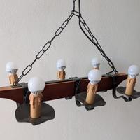 Lampadario rustico in legno/ferro stile taverna