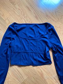 Top a maniche lunghe blu