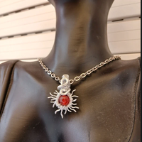 collana acciaio ciondolo a forma di sole corniola