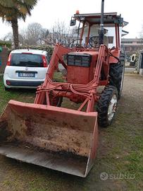 Carica frontale con pale e forche e ruote