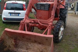 Carica frontale con pale e forche e ruote