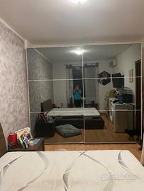 Armadio a specchio  con letto contenitore