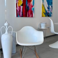 Poltrona stile Vitra Eames dondolo