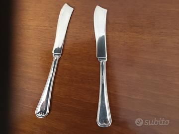 Due coltelli da pesce  in silver