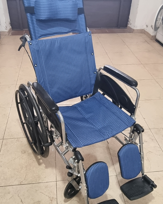 Sedia a rotelle ripiegabile