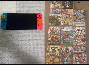 Nintendo switch OLED con giochi e accessori