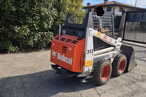 P180-Mini Pala Bobcat 313