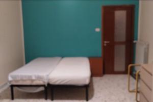 Ampia camera singola con letto matrimoniale