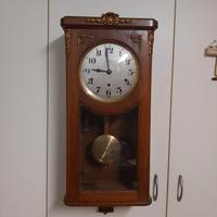 orologio antico a pendolo