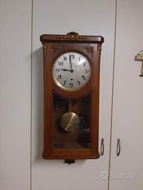 orologio antico a pendolo