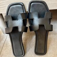 Sandali bassi neri a fascia H – numero 38