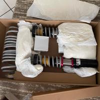 Assetto a ghiera regolabile