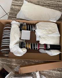 Assetto a ghiera regolabile