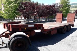 rimorchio pianale 3 assi agricolo e macchina opera