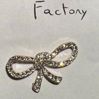 Mono orecchino fiocco argentato