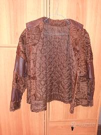 Giacca di astrakan e pelle