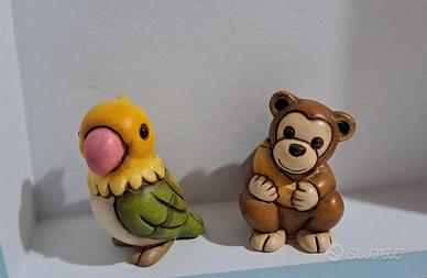 Pappagallo e scimmietta thun
