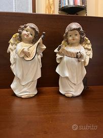 Due angioletti con strumenti musicali