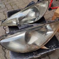 Fari anteriori Peugeot 206 originali usati
