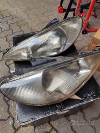Fari anteriori Peugeot 206 originali usati

