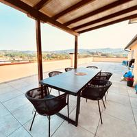 Sedie da esterno in metallo e corda