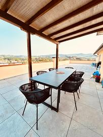 Sedie da esterno in metallo e corda