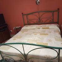 camera da letto in ferro battuto