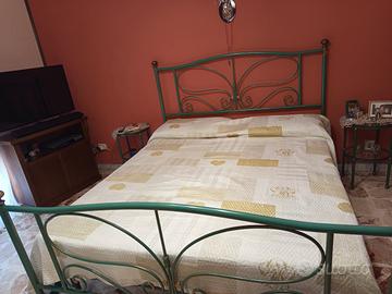 camera da letto in ferro battuto