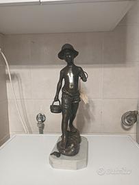 scultura in bronzo il pescatore 