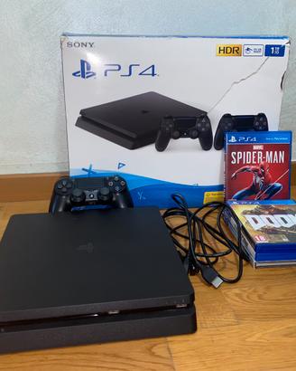 PS4 slim 1TB e 1 joystick + giochi