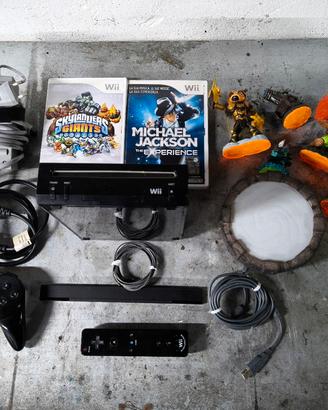 Wii + cavi + joystick + Pad + giochi