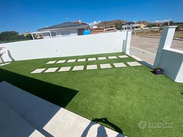 Giardini prato sintetico