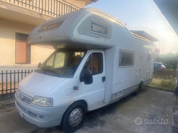 Camper arca 715 glt mansardato con portamoto