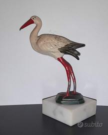 Cicogna in metallo su basi di marmo