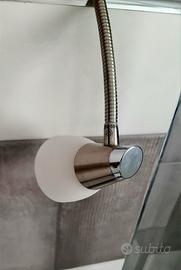 Lampada in acciaio girevole con interruttore