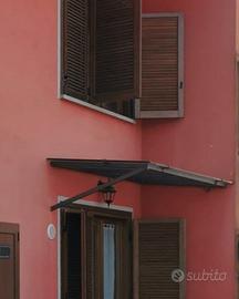 pensilina doppio vetro e ferro battuto