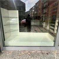 Espositore per vetrina