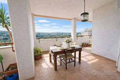 Elegante Appartamento con Terrazza e Garage