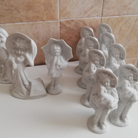 Lotto 11 statuine bisquit Capodimonte