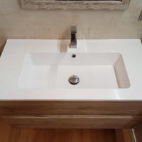 Coppia lavabo mineralmarmo e miscelatore Jacuzzi 