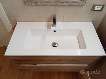 Coppia lavabo mineralmarmo e miscelatore Jacuzzi 