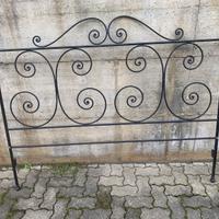 Testiera realizzata dallo scultore Antonio Murri